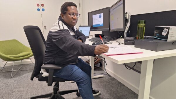study_tips_featured Student using study tips to plan a focused revision session.