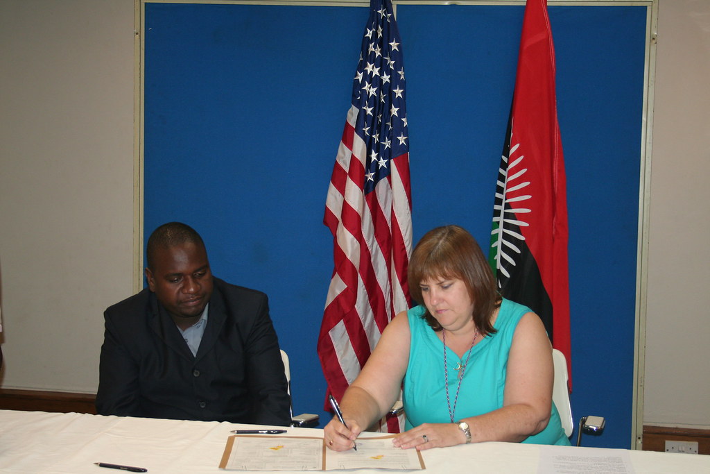 George Kayange during the grant signing ceremony for the school library construction project