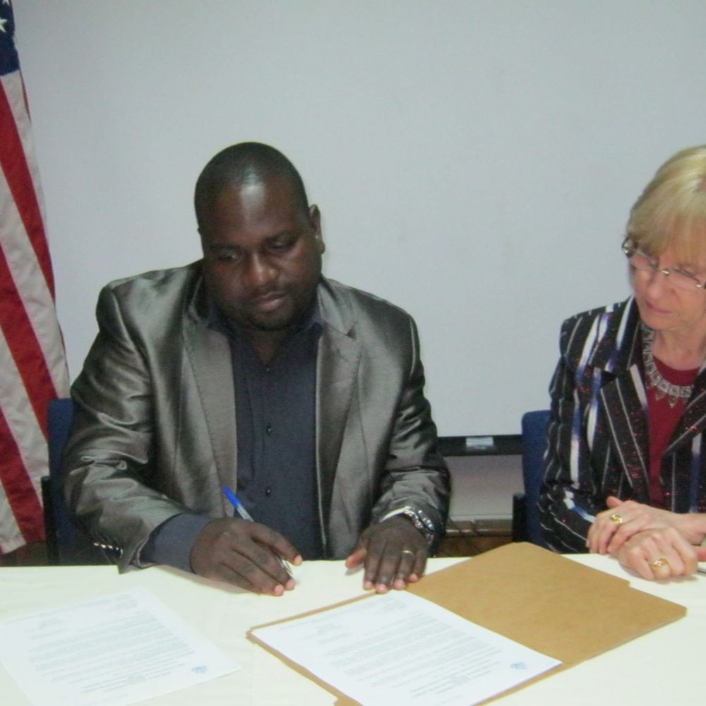 Signing ceremony for the FEDOMA's PEPFAR project on health services for persons with disabilities in Malawi.
